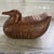 Vintage hand carved teak wood duck box from Thailand. Measures approximately 10'' X 6.5". The duck has a secret...
