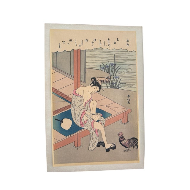 Beautiful Japanese woodblock print featuring a woman doing her toenails. Lovely texture and vibrancy, please see the...