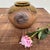 Beautiful Shigaraki flower vase adorned with a stunning motif applied in the pottery. Dimensions: height 20 cm, diameter...
