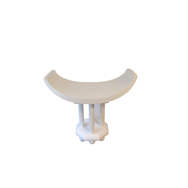 Vintage art deco Jules Leleu style wooden stool. Stool has been painted white and sits on 8 round feet.