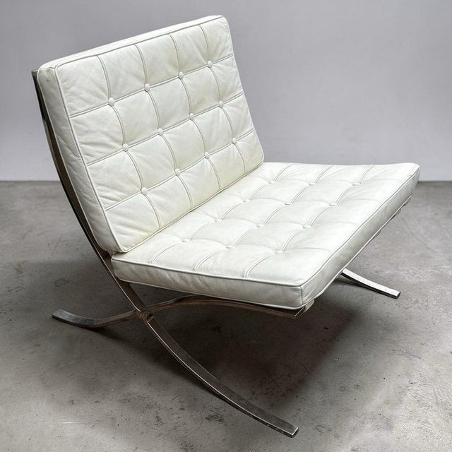 Barcelona Chair and Ottoman Sizes Chair :- 73 cmd high. 78 cms wide, 78 cms depth. Ottoman 37 cms high, 62 cms wide, 58...