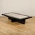 A Modernist rectangular coffee table with a unique surface of delicate eggshell fragments on a solid walnut base....
