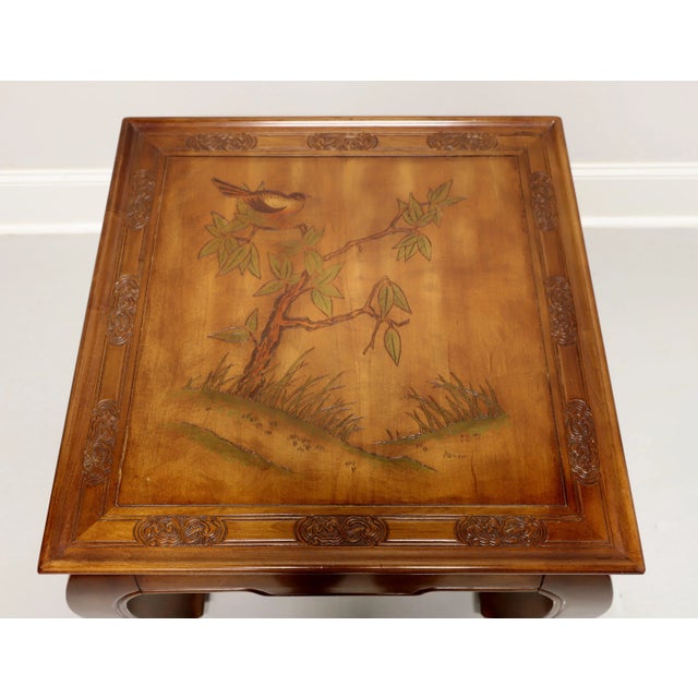 An Asian Ming style side table, unbranded. Solid hardwood with carved Chinoiserie scene to top, Ming style apron and legs....