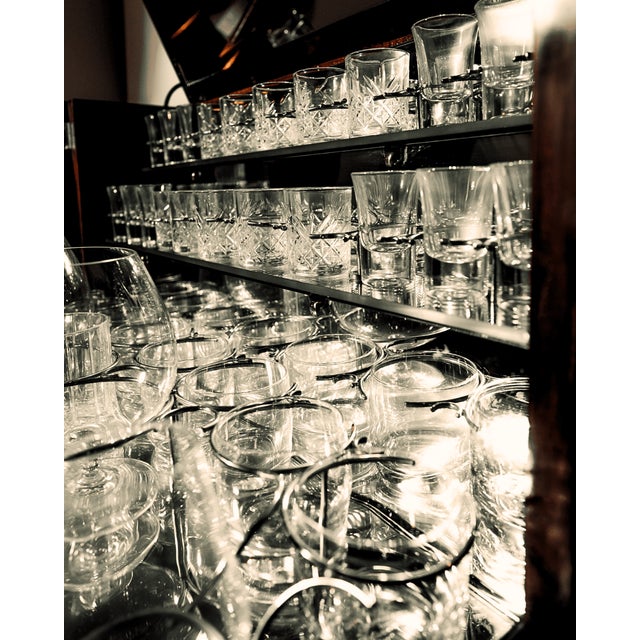 This magnificent, fully restored extendable bar cabinet is a unique piece that captivates with both its aesthetics and its...