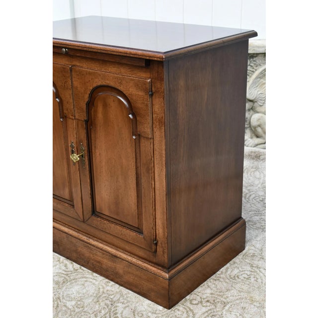 Vintage (1970's) Cabinet with Pull-Out has a Traditional Style. Made by Kittinger Furniture. The Cabinet has Two Doors...