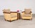 Impressive pair of oversized rattan lounge or club chairs designed by John Hutton for Donghia in the late 20th century....