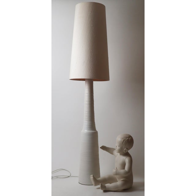 White Ceramic Floor Lamp by Mobach, 1970s, in Very Good conditions. Designed 1960 to 1969 This piece has an attribution...