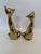 Add a touch of Mid-Century sophistication to your décor with this charming pair of stylized brass cat figurines. Featuring...