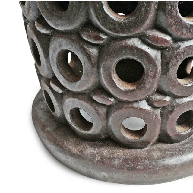 Authentic hand carved Bamileke tribal wood stool. Masterfully crafted from one piece of indigenous wood. Impressive and...