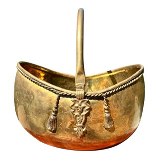 Mid 20th Century Large Sold Brass Decorative Basket With Tassel Accents and Movable Handle For Sale