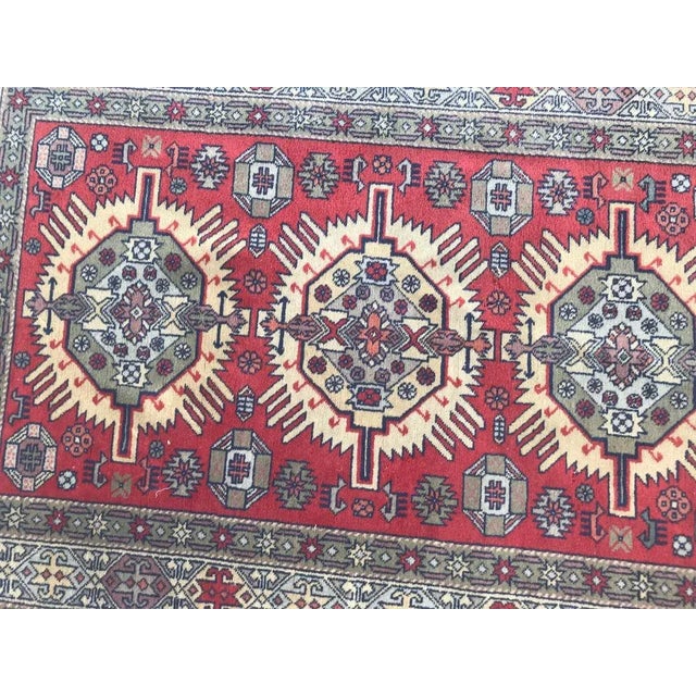 Beautiful 20th century Shirvan rug with a geometric design and red, yellow and green colors, entirely hand knotted with...