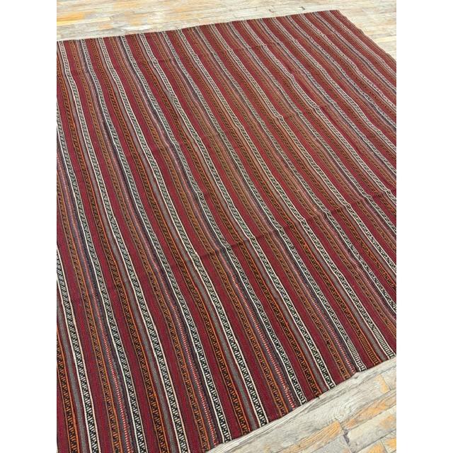 this mid-20th-century Turkish Decorative textile is an exceptional example of Anatolian tribal flat-weaving craftsmanship....