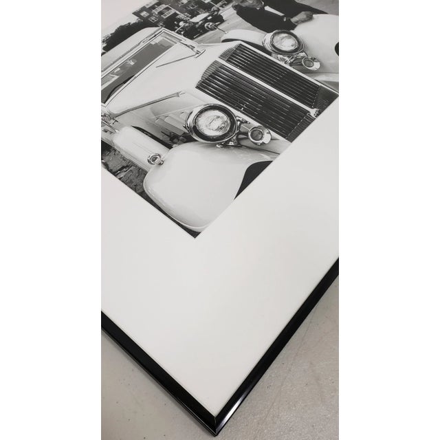 Leo Theinert (American) "Daddy Warbucks" Original Black and White Silver Gelatin Photograph 20th c. A limo driver with a...
