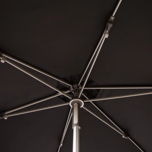 Create a shady oasis on the patio or poolside with this push-up umbrella in the style used in Europe everywhere from...