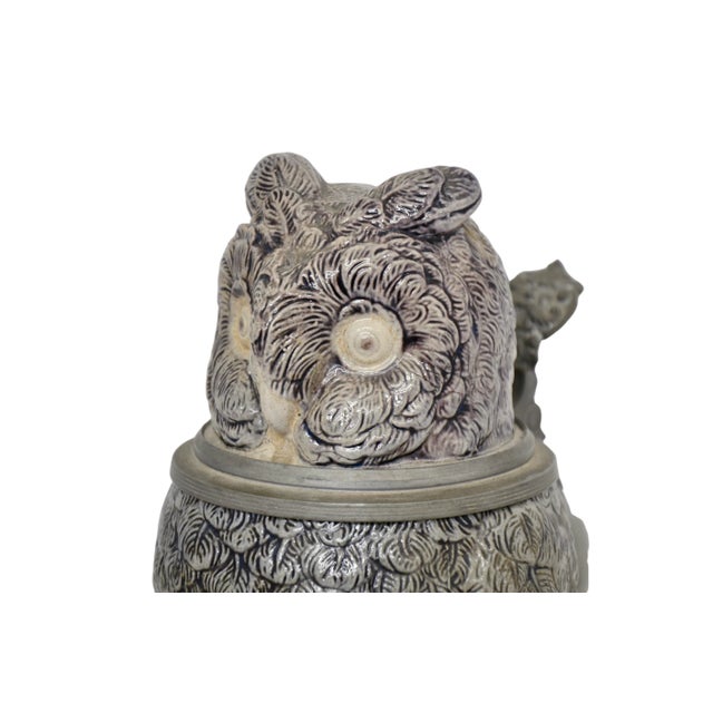 Hauber & Reuther of Freising, Bavaria hand crafted stein with all pewter fittings surrounding a raised relief sculptural...