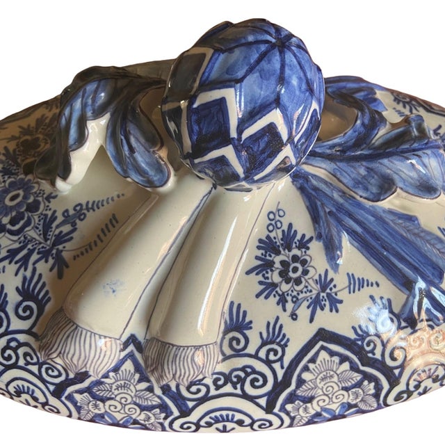 Lidded soup tureen and matching base in white ironstone with cobalt blue decoration, in the style of the great Delft...