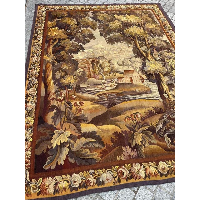 Late 19th Century Aubusson Tapestry – Pastoral Landscape with Floral Border A beautiful late 19th-century Aubusson...