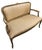 A shapely, two-seater sofa in the French style. Upholstered with beige fabric with vertical stripes. Wooden elements in...
