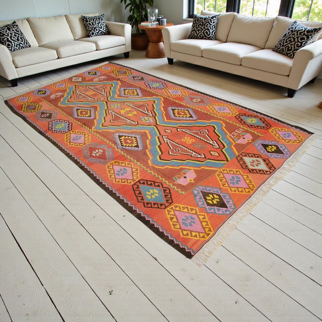 Handwoven in 1982 in the Nakhchivan Autonomous region on Turkey’s far eastern border, this village kilim belongs to the...