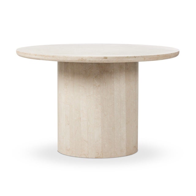 Simple and impactful, this marble outdoor dining table features a pedestal base with a monolithic effect. The base comes...