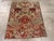 An antique Turkish Caucasian Karabagh throw rug handmade during the Early 20th century. Measures: 3' 4" x 4' 1"