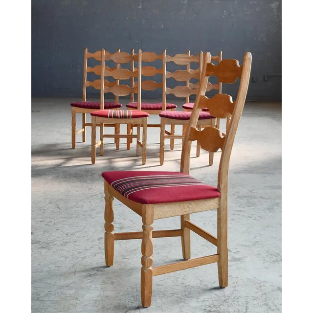 Set of 6 Razorblade style Danish oak dining chairs by Henning ("Henry") Kjærnulf made in the late 1960's. Very typical of...