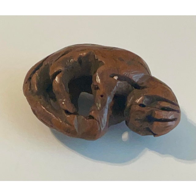 Unusual hand carved peach stone or monkey seed folk art. These fruit pit carvings were done in the USA in the 1920's and...