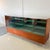 Crafted in Germany during the 1960s, this architectural display counter pairs rich mahogany veneer with a minimalist six-...