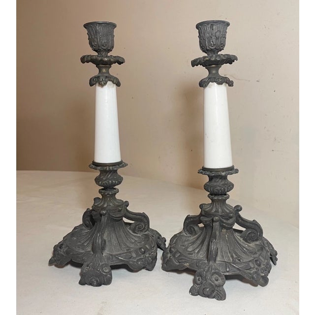 Up for sale is a nice quality pair of antique ornate Victorian candlesticks. They are made from a bronze patinated metal...