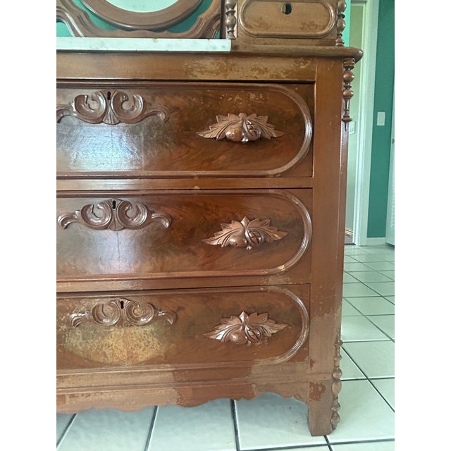 Beautiful antique Victorian walnut dresser dating to approximately the 1870s, featuring richly figured burl walnut drawer...