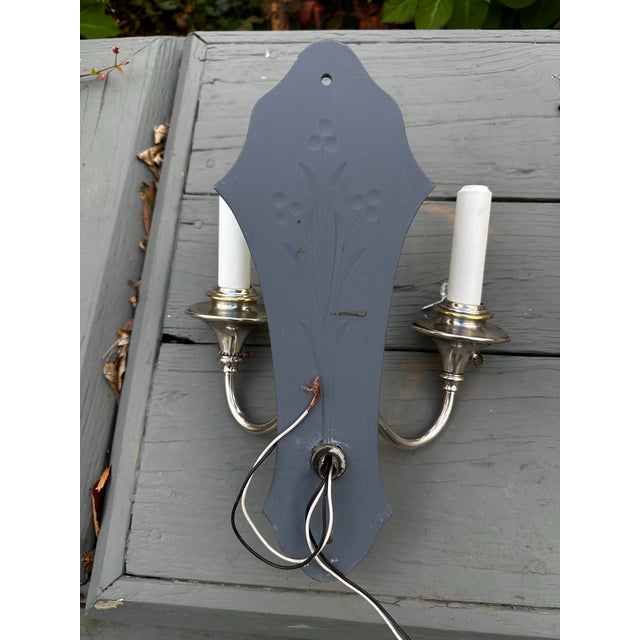 Old Lights On is please to offer this rare set of three silver plated mirrored back wall sconces, attributed to Caldwell....