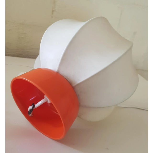 Cocoon Table Lamp with Orange Base, 1970s, in Very Good conditions. Designed 1970 to 1979 European Plug (up to 250V).The...