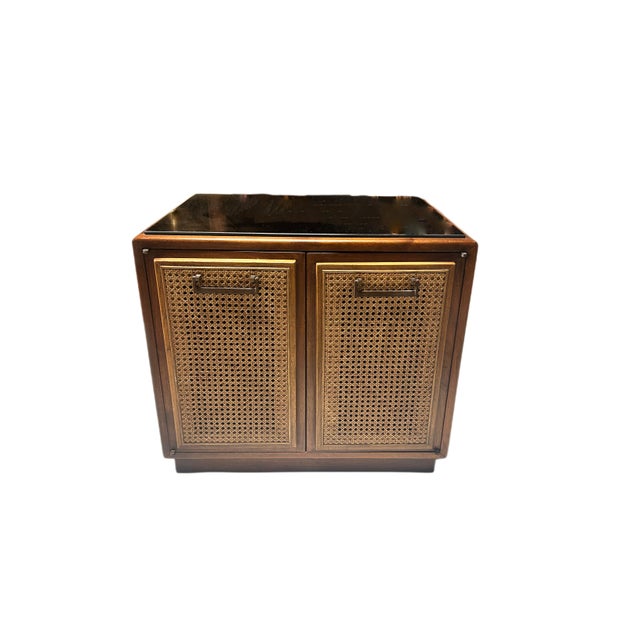 These classic fashioned Mid Century Caned Front double door nightstands are forever in style with there darkened glass...