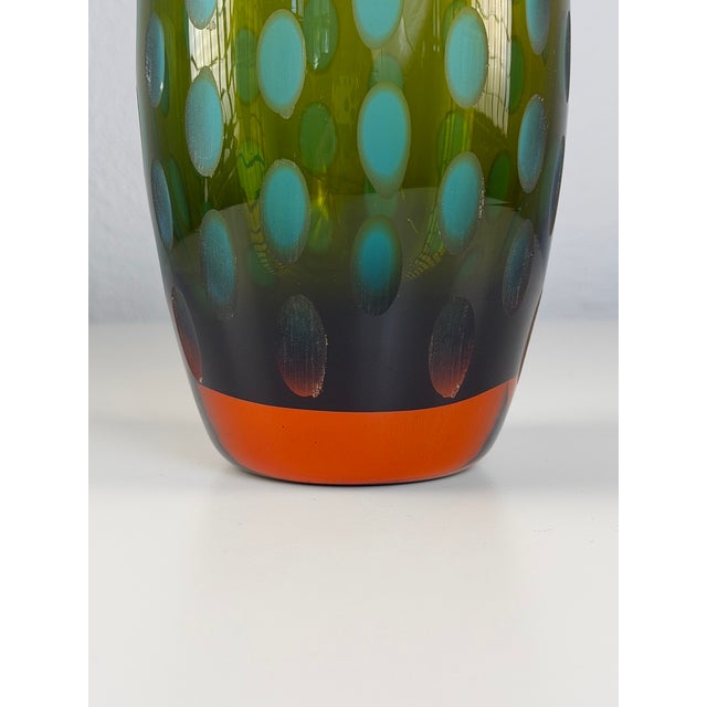 Decorative “Thumbprint” glass vase by BoConcept, featuring a distinctive sculptural surface and a beautiful combination of...
