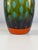 Decorative “Thumbprint” glass vase by BoConcept, featuring a distinctive sculptural surface and a beautiful combination of...