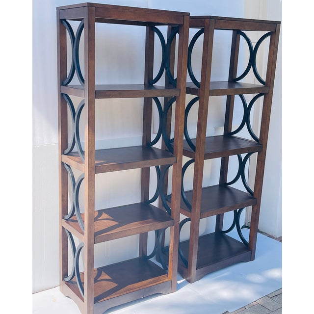 Super elegant pair of bookcase shelves, etagere. In 4 levels with black semicircle accents on the sides.
