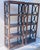 Super elegant pair of bookcase shelves, etagere. In 4 levels with black semicircle accents on the sides.