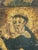 A charming Spanish Colonial hand-painted devotional retablo depicting Saint Dominic, founder of the Dominican Order. The...