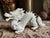 A striking vintage Fitz and Floyd ceramic dragon figurine, sculpted in high relief with a coiled serpentine body, open...