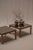 Elegant pair of mid-century side tables from the 1970s, featuring clean architectural lines, warm wooden frames and...
