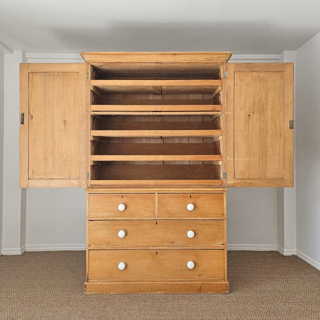 Dimensions: 20.5"D × 48.5"W × 81"H Shelves: 8.5"H × 15.75"D × 45"W A beautifully proportioned antique English pine linen...