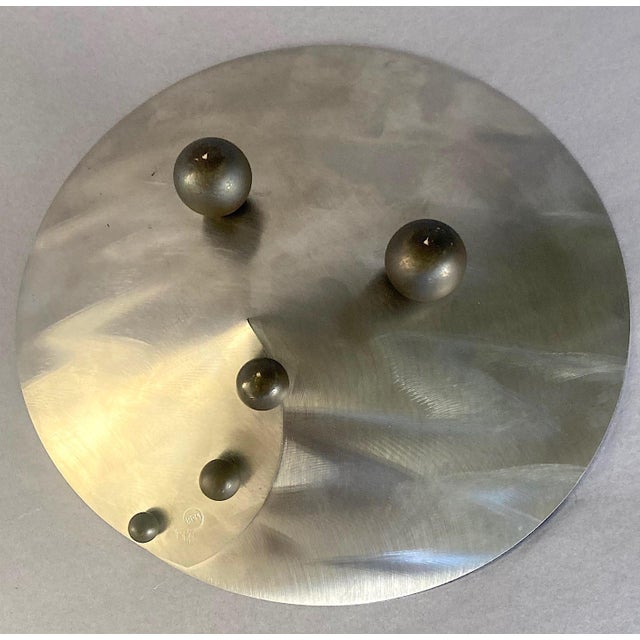 Born in 1958 in Burlington, Vermont, Bruce R. MacDonald creates captivating metal works out of stainless steel. MacDonald...