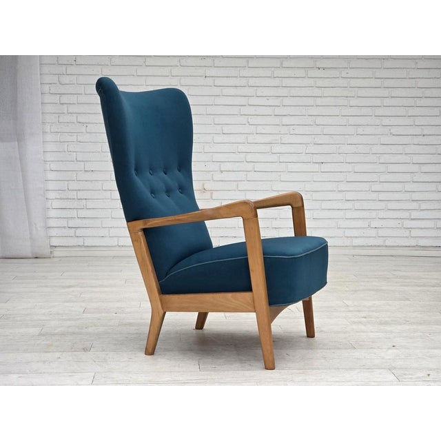 1970s, Danish armchair by Fritz Hansen. Original turquoise blue furniture wool, lacquered beech wood, springs in the seat....