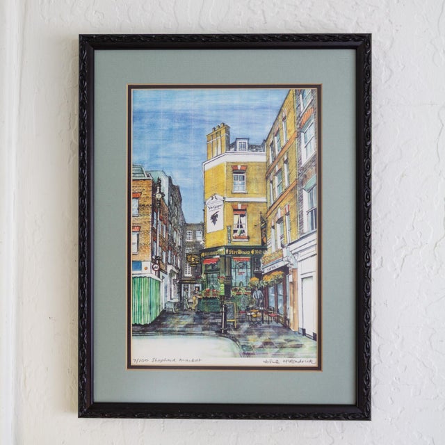 This watercolor illustration of Shepherd Market in Mayfair, London, is a limited-edition print, number 7/100, signed Josie...