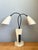 Embodying the playful organic forms of atomic-era design, this vintage mid-century modern double arm table lamp features...