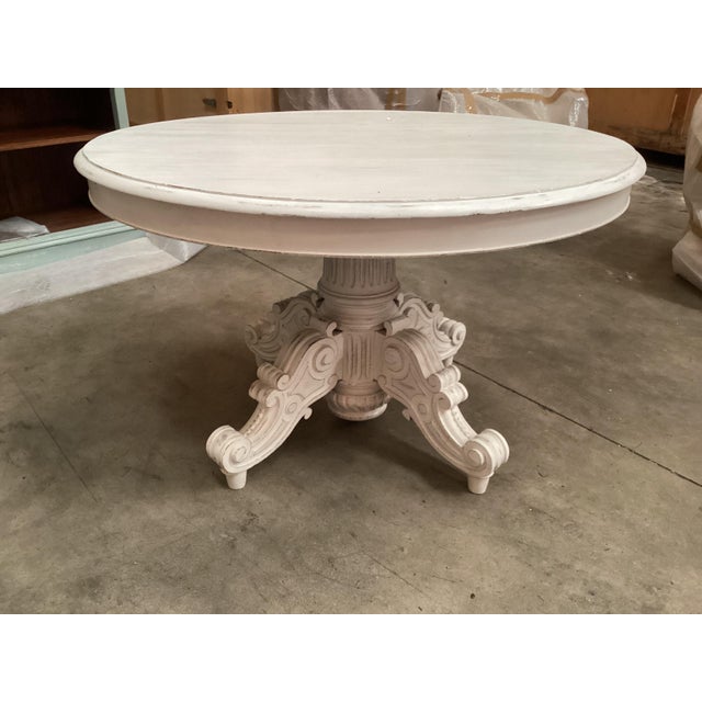 This French painted table has many potential uses in your home decor. Made of French oak and painted white, the oval top...