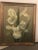 An elegant oil on Canvas painting featuring columbian catalina flower. The painting is nicely framed in a custom wooden...
