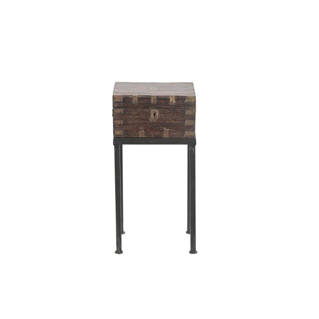 This Vintage Anglo-Indian Teak and Brass Small Chest on Iron Legs/Side Table is handcrafted from solid teakwood and...