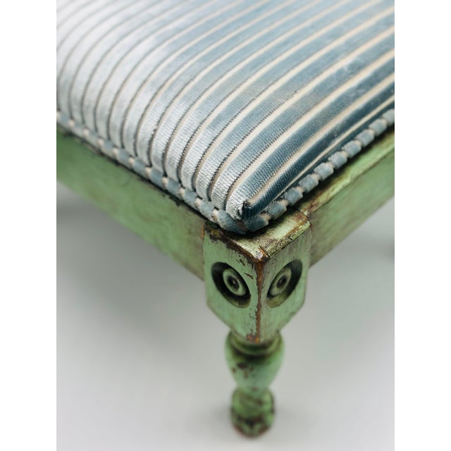 This beautiful antique stool has a new life with great new fabric! It was painted at some point in its life in this...