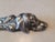 Antique circa 1890 silver-plated figural cigar cutter featuring a handsome hound/hunting dog profile surrounded by raised...